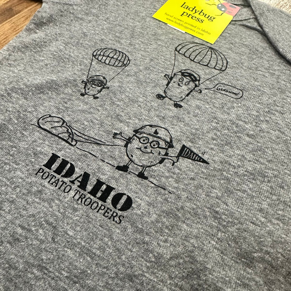 Idaho Potato Trooper Onesie. Eco-friendly Water based Inks