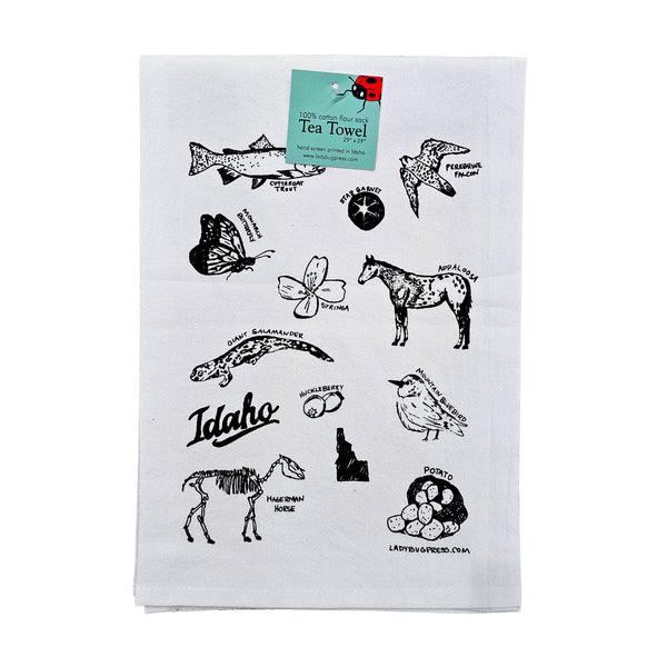 Symbols of Idaho tea towel black ink on white towel