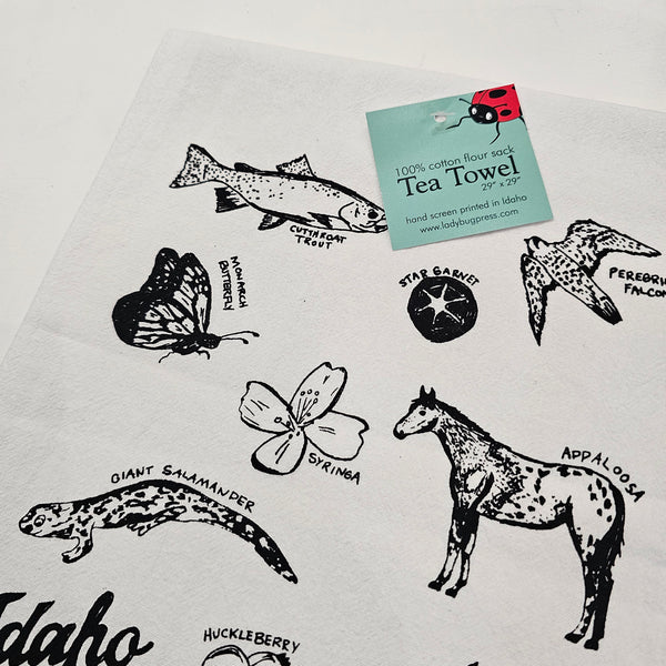 Symbols of Idaho Tea Towel